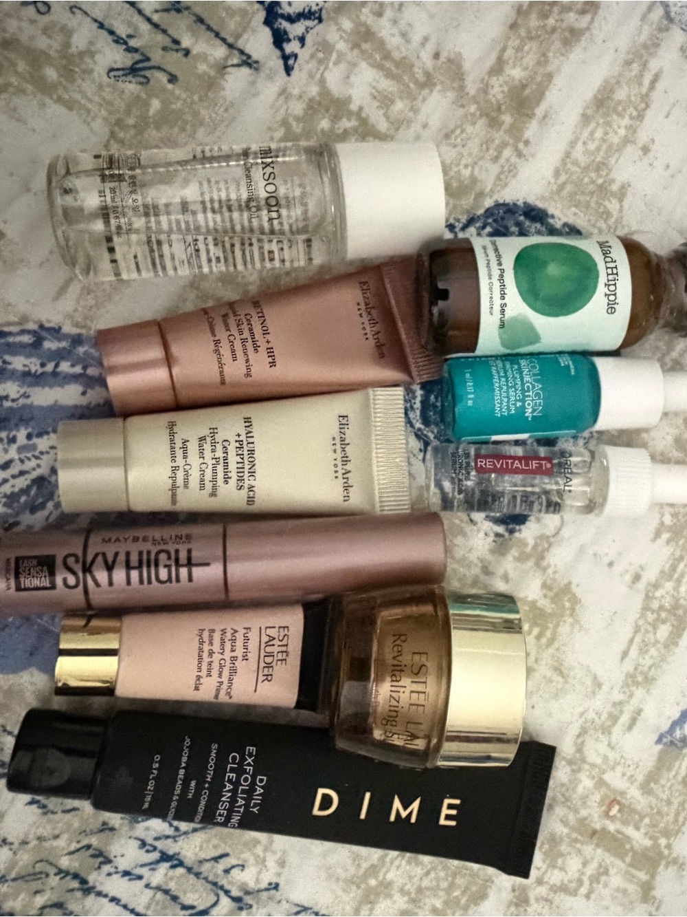 Travel size beauty products by Elizabeth Arden and Estée Lauder